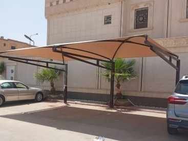 مظلات حديد على شكل خشب للمنازل والفلل
